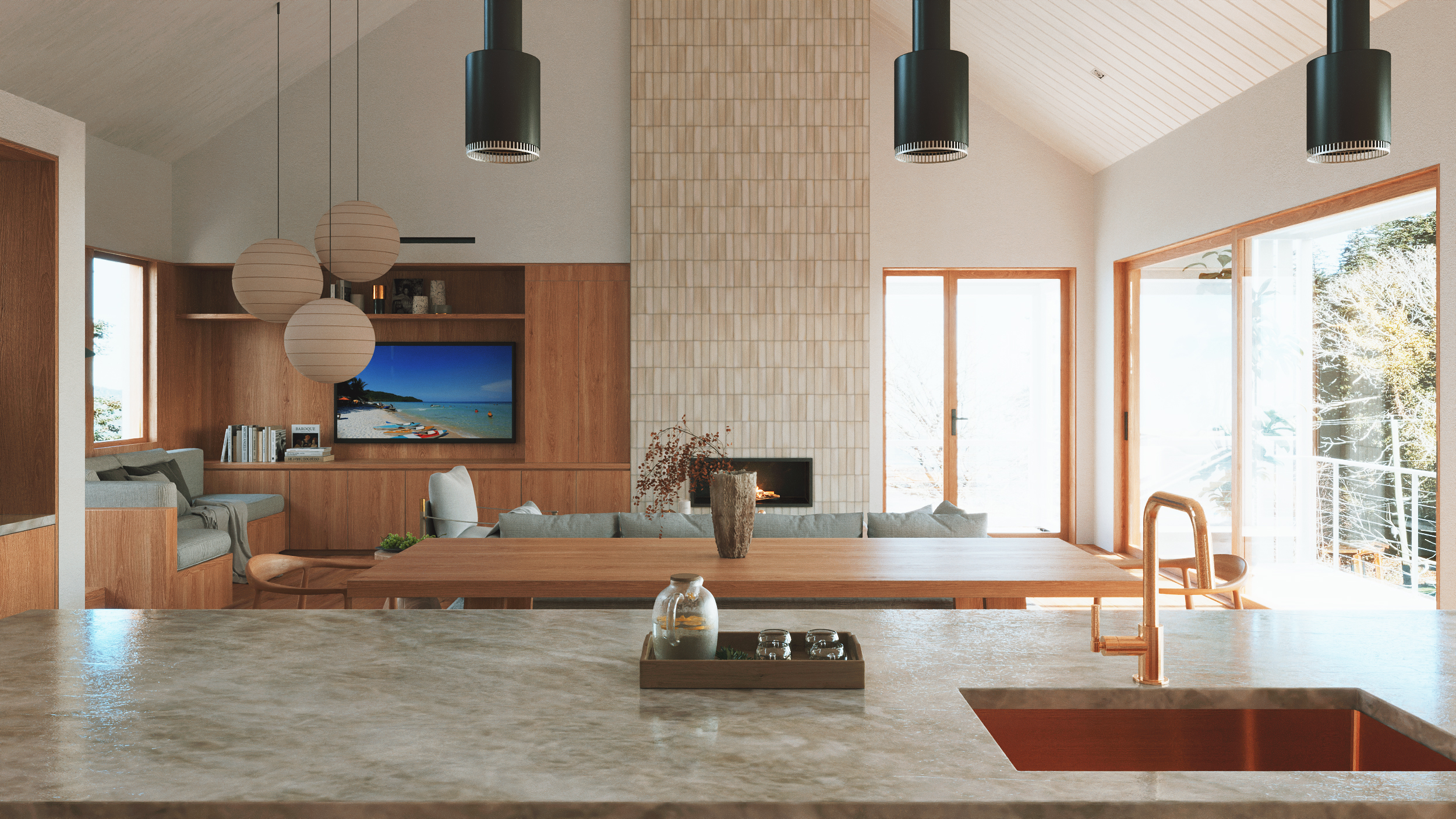 Modern open-concept living and kitchen interior featuring a tall vertically-tiled fireplace surround, hanging cylindrical black pendant lights, custom wood cabinetry with an integrated TV, and a stone kitchen island in the foreground.