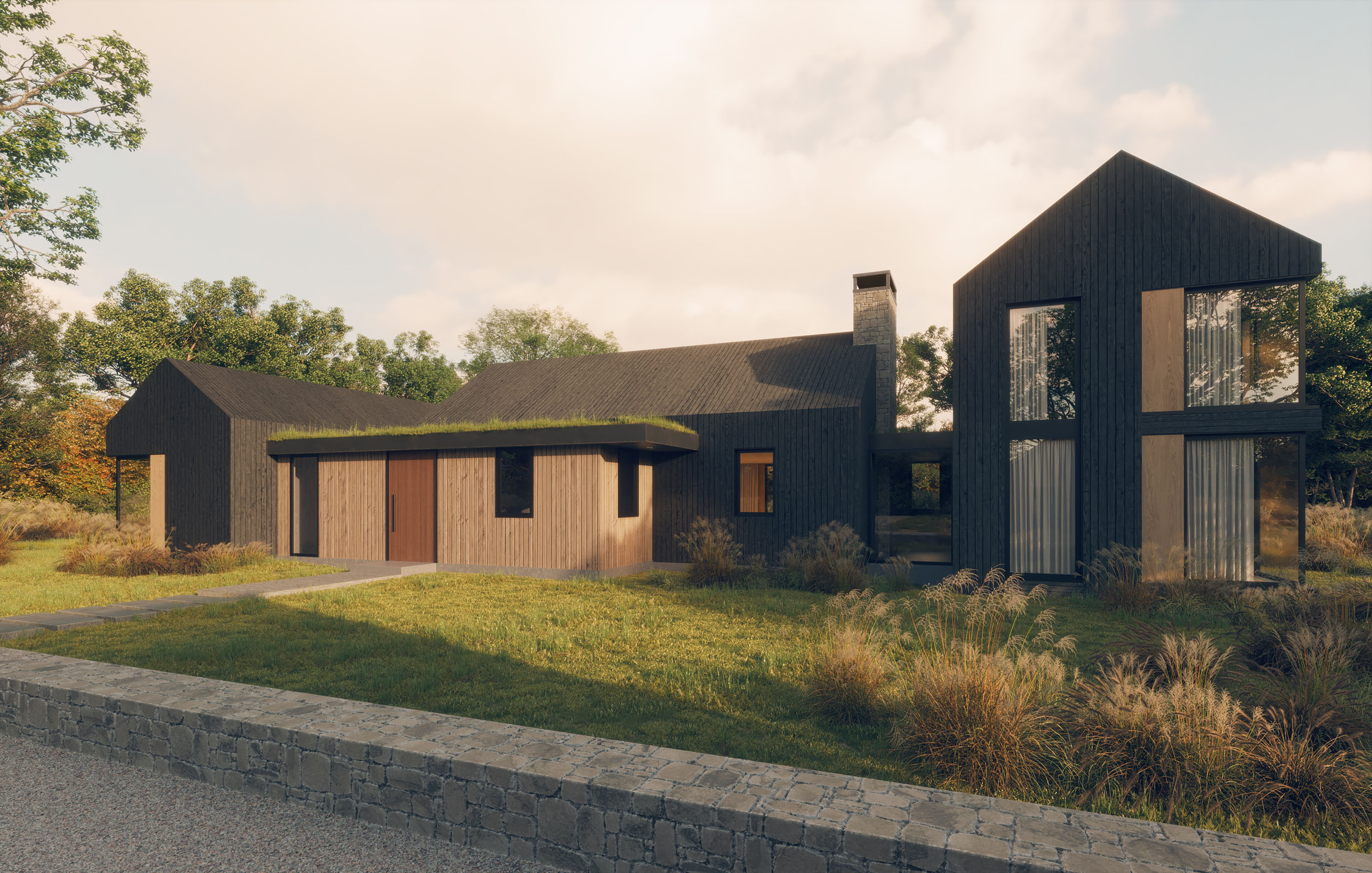 Modern dark-wood home exterior featuring a low-slung shingle-roofed volume with a green roof, vertical wood siding, a stone chimney, and a foreground stone retaining wall and lawn.