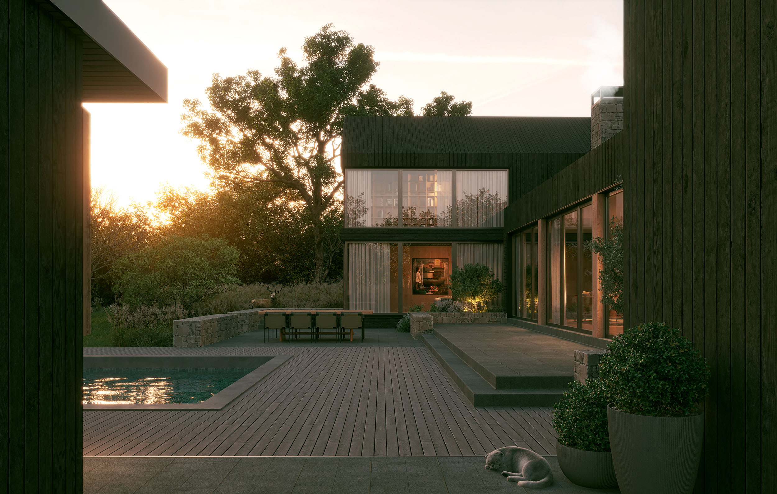 Modern dark-wood home exterior at sunset featuring a spacious wooden pool deck, a swimming pool, expansive floor-to-ceiling windows, an outdoor dining setup, and stone retaining walls amidst a natural landscape.